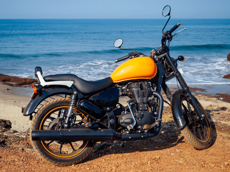 Motorcycle in front of a beach in Spain